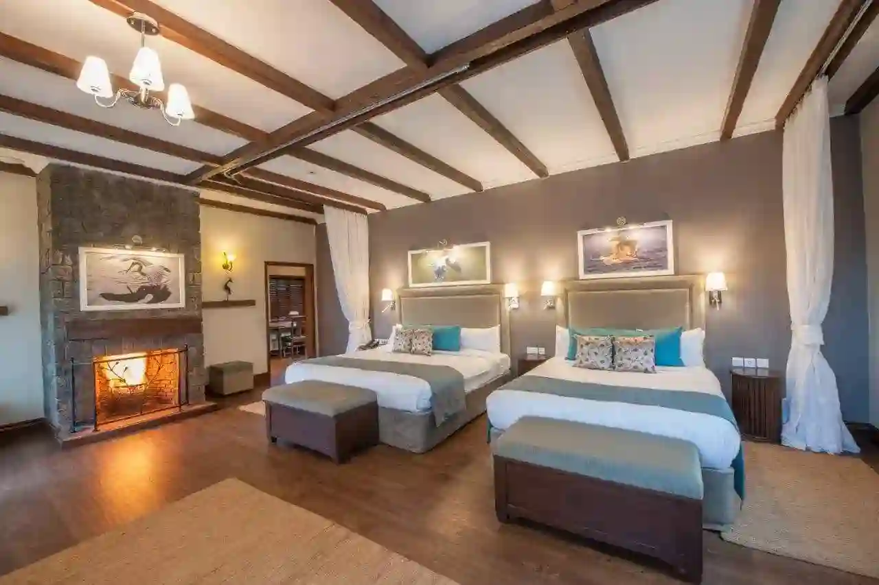 Twin room with fire lit, the retreat at ngorongoro Hotel in Karatu